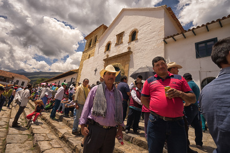 July 16, 2017 Villa de Leyva, Colombia: crowd in front of the church in the main plaza during the annual fiestaのeditorial素材