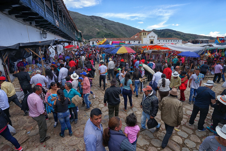 July 15, 2017 Villa de Leyva, Colombia: crowd fills up the streets of the colonial town during the annual religious fiestaのeditorial素材