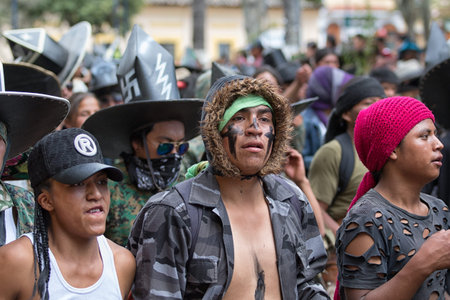 June 29, 2017 Cotacachi, Ecuador: closeup of kichwa indigenous people marching on the street during Inti Raymi festivalのeditorial素材