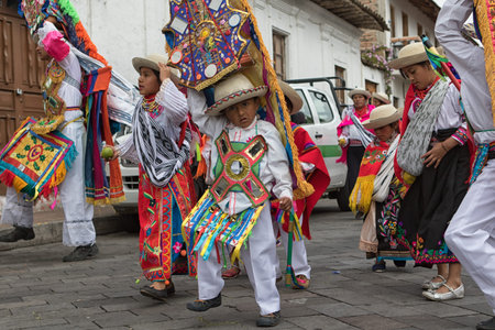 June 18, 2017 Pujili, Ecuador: indigenous young kichwa children wearing a colourful traditional...