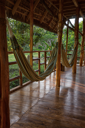 June 6, 2017 Puerto Misahualli: hammocks in eco lodge built from bamboo in the jungeのeditorial素材