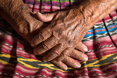 January 26, 2015 San Pedro la Laguna: hands of a very old Tzutujil Maya woman in the small indigenous town on the shore of Lake Atitlanのeditorial素材