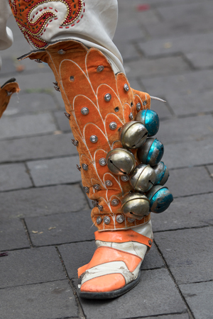 June 17, 2017 Pujili, Ecuador: dancer's boots decorated with bells at the Corpus Christi annual paradeのeditorial素材