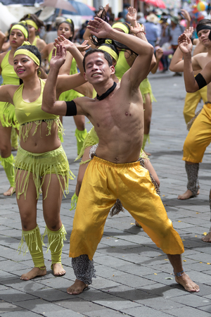 June 17, 2017 Pujili, Ecuador: young dancers in bright color costumes at Corpus Christi festivalのeditorial素材