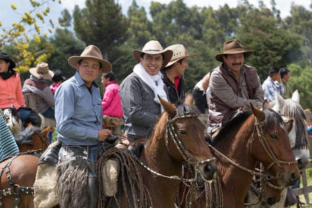 June 10, 2017 Toacazo, Ecuador: local cowboys called 'chagra' having a chat on horsebackのeditorial素材