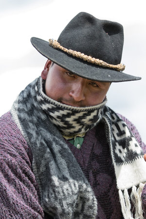 June 10, 2017 Toacazo, Ecuador: closeup of an indigenous cowboy wearing a shal in the cold morning of the high altitude Andesのeditorial素材