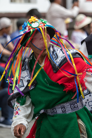 June 17, 2017 Pujili, Ecuador: traditional colourful kichwa man hat with colorful strings worn at the Corpus Christi annual parade in the Andean townのeditorial素材