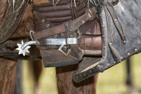 June 10, 2017 Toacazo, Ecuador: metal spur on leather boot worn at the rodeosの写真素材