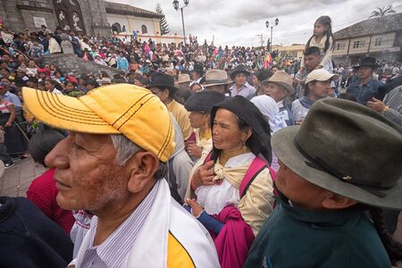 April 14, 2017 Cotacachi,Ecuador: indigenous kechwa crowd at the Easter procession wathing the reenacting of crucifixionのeditorial素材
