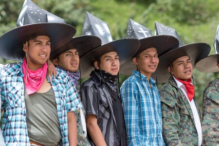 May 27, 2017 Sangolqui, Ecuador: indigenous dancers posing at a rural rodeo where they wll open the events with their performanceのeditorial素材