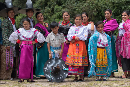 May 27, 2017 Sangolqui, Ecuador: indigenous dancers posing at a rural rodeo where they wll open the...