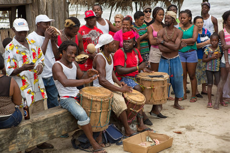 March 8, 2015 Sambo Creek, Honduras: young garifuna men playing traditional drums outdoors