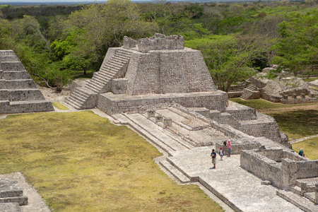 April 20, 2014 Campeche, Mexico: tourists visiting the ancient mayan structures at the Edzna...
