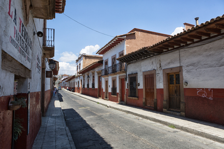 March 25, 2014 Patzcuaro, Mexico: the town kept its colonial look over time, with buildings made out of adobe and tiled roofsのeditorial素材