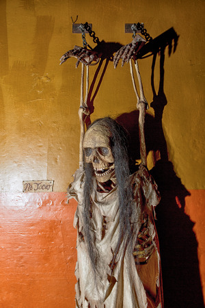 May 20, 2014 Zacatecas, Mexico: puppet chained to the wall as example in the inquisition and torture museumのeditorial素材