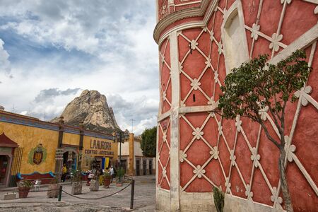 March 1, 2016 Bernal, Mexico: Mexico: colonial buiding facade in the historic center of the popular tourist town with the monolith of Bernal in the backgroundのeditorial素材