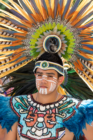 March 4,2016, San Miguel de Allende, Mexico: indigenous man wearing colourful traditional head dress decorated with feathersand costume at the Senior de la Conquista dance celebrationのeditorial素材