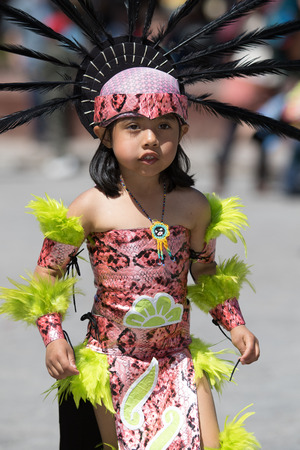 March 6, 2016, San Miguel de Allende, Mexico: indigenous child dressed in traditional costume performing ritual dance at the Senior de la Conquista celebrationのeditorial素材