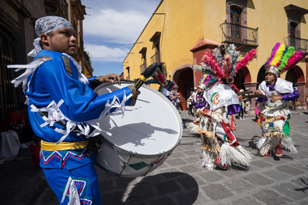 March 4, 2016, San Miguel de Allende, Mexico: A drummer is setting the rhytm for street dancers at  the Senior de la Conquista celebrationのeditorial素材