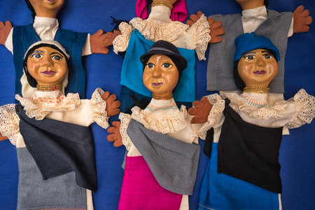 Otavalo, Ecuador- November 25, 2017: closeup of indigenous dolls sold in the Saturday artisan market