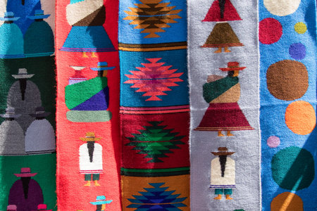 Otavalo, Ecuador-December 23, 2017: indigenous artisan textiles for sale in the local marketのeditorial素材