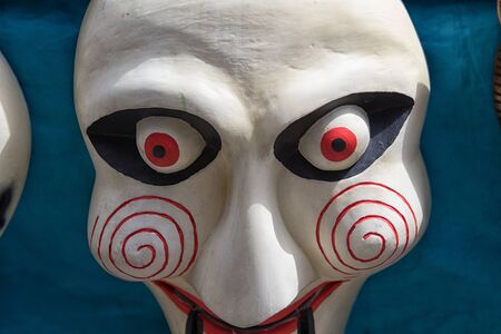 Otavalo, Ecuador-December 23, 2017: closeup of an indigenous mask for sale in the artisan marketのeditorial素材