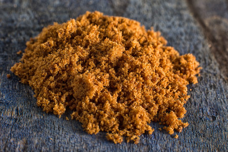 coconut sugar closeup on rustic wood surfaceの写真素材