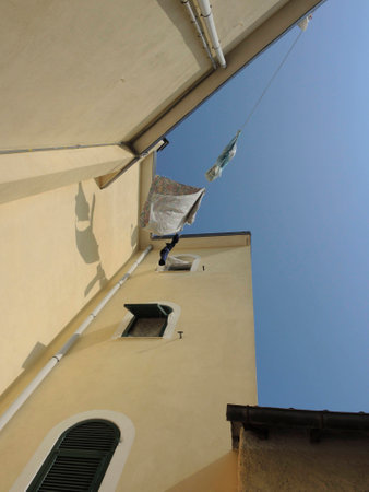 Laundry hanging on ropeの写真素材