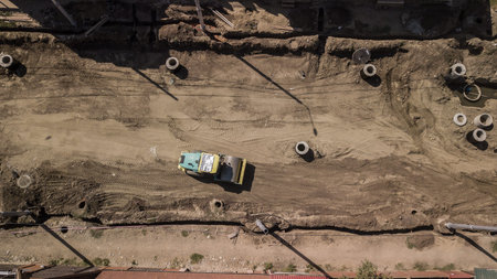 Aerial directly above top down view of a construction site.