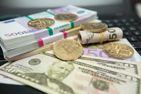 Golden bitcoin background. Bitcoin cryptocurrency. High resolution photo.の写真素材