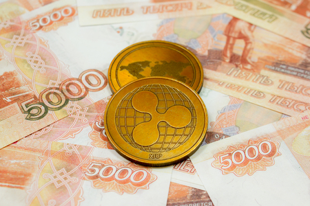 Ripple coin close up on money background.の写真素材