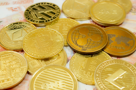 Closeup of ethereum, litecoin, ripple and bitcoin stackの写真素材