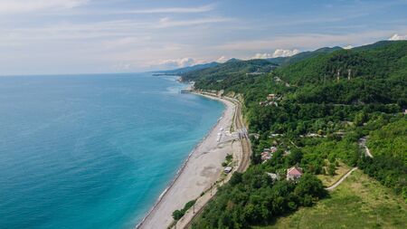 Drones Eye View - winding road from the high mountain pass to Sochi, Russia. Great road trip.の写真素材