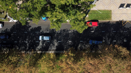 City roads from above - modern urban traffic intersection in august