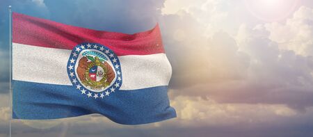 Close up flag blowing in the wind. Waved highly detailed fabric texture.の写真素材