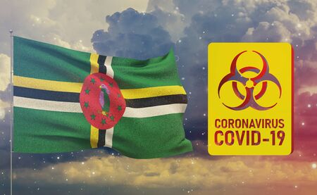 COVID-19 Visual concept - Coronavirus COVID-19 biohazard sign with flag of Dominica. Pandemic 3D illustration.の写真素材
