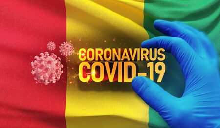 Coronavirus COVID-19 outbreak concept, health threatening virus, background waving national flag of Guinea. Pandemic stop Novel Coronavirus outbreak covid-19 3D illustration.の写真素材