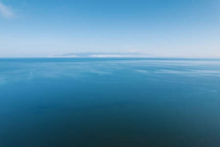 Summertime imagery of Lake Baikal is a rift lake located in southern Siberia, Russia Baikal lake summer landscape view from a cliff near Grandmas Bay. Drones Eye View.の写真素材