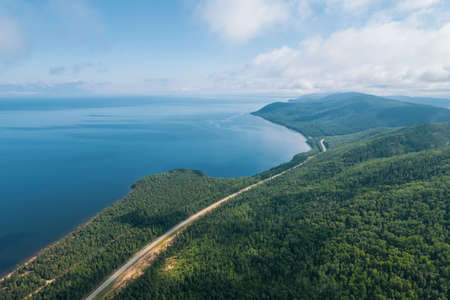 Summertime imagery of Lake Baikal is a rift lake located in southern Siberia, Russia Baikal lake summer landscape view from a cliff near Grandmas Bay. Drones Eye View.の写真素材