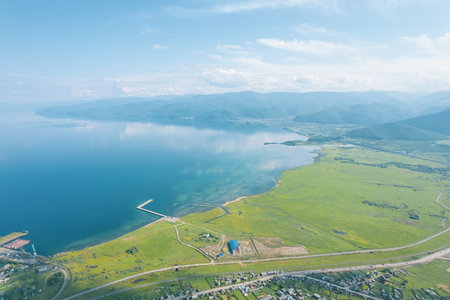 Summertime imagery of Lake Baikal is a rift lake located in southern Siberia, Russia Baikal lake summer landscape view from a cliff near Grandmas Bay. Drones Eye View.の写真素材