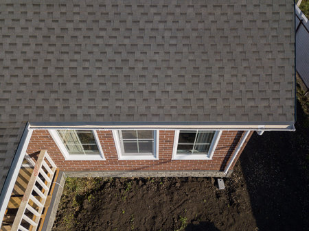 Shingles texture - close up view of asphalt roofing shinglesの写真素材