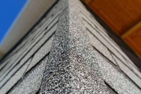 Shingles texture - close up view of asphalt roofing shinglesの写真素材