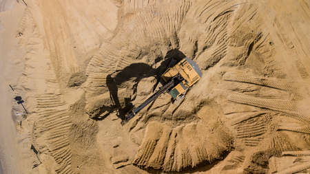 Top view of excavator working in construction site.の写真素材