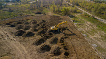 Top view of excavator on construction site