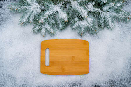 Christmas holidays composition on snow background with copy space for your textの写真素材