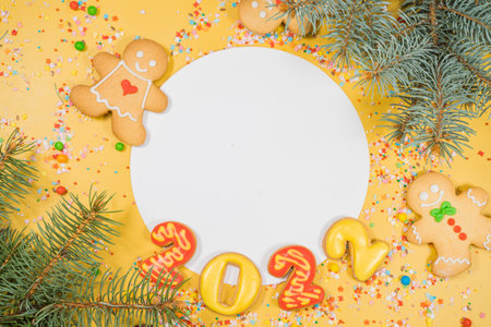 New years 2022 holidays composition on yellow backgroundの写真素材