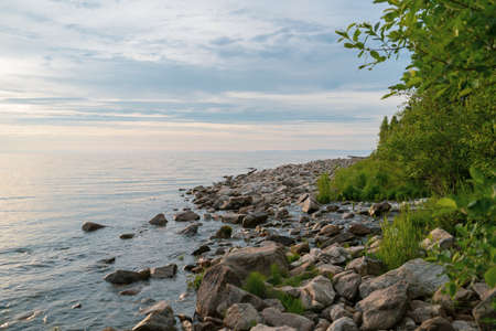 Picturesque view of Lake Baikal in sunrise .Rift lake located in southern Siberia, Russia. The largest freshwater lake by volume in the world. A Natural Wonder Of The World.の写真素材