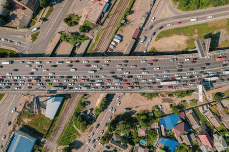 Transport Aerials - top down view of freeway busy city rush hour heavy traffic jam highway.の写真素材