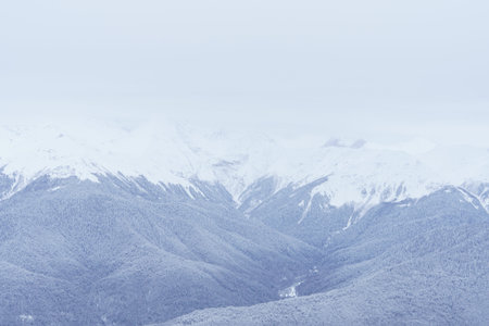 Winter mountain landscape: The Rosa Khutor Alpine Resort near Krasnaya Polyana panoramic background.