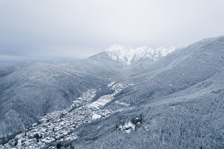 Winter mountain landscape: The Rosa Khutor Alpine Resort near Krasnaya Polyana panoramic background.の写真素材